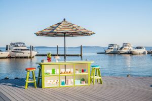 Lime Green on White 3ft x 8ft SummerSide Bar with 6 Bar Stools on a boat dock