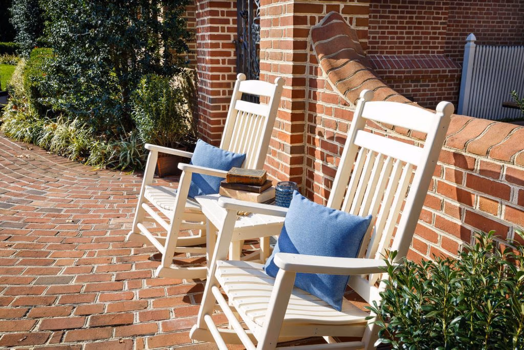 Two White poly porch rockers