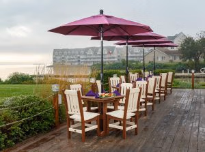 Walnut on Ivory poly colored Keystone chairs around Great Bay tables.
