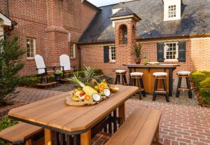 Poly Bar with four bar stools and mission style poly dining set