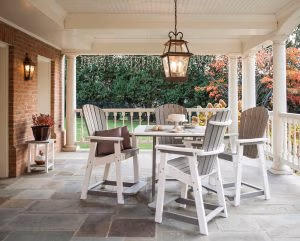 Bar height square dining table with four bar height fan back dining chairs