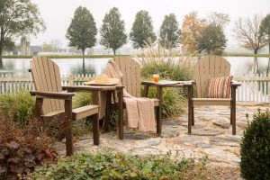 Three fan back chairs with tete-a-tete tables