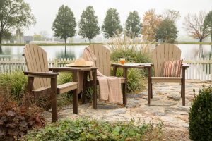 Three fan back chairs with tete-a-tete tables