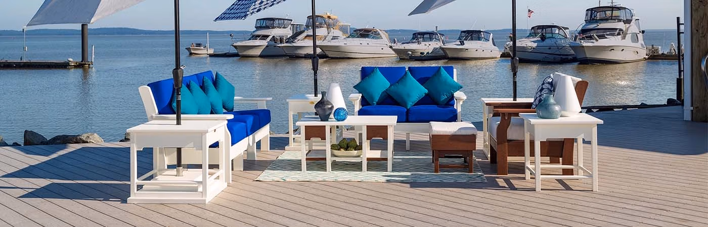 van buren deep seating outdoor furniture on dock by the bay with boats in the background