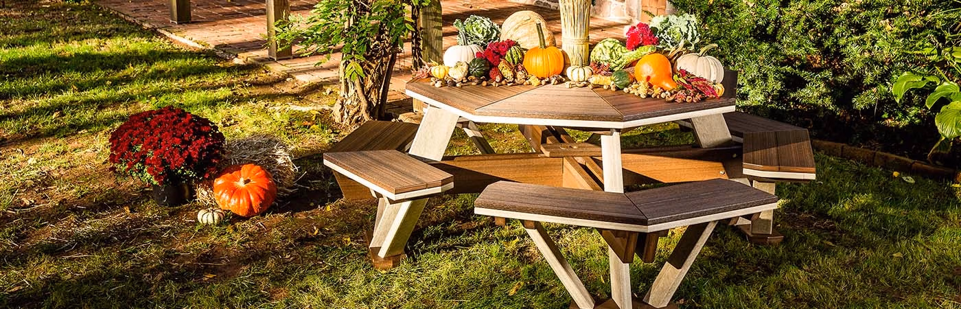 picnic table loaded with autumn decorations