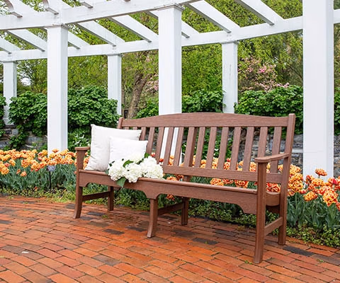 Avonlea Garden Bench in Flower Garden