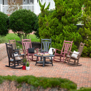 Poly porch rocking chairs set in a semi-circle on an outdoor patio.