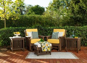 Two Mission Deep seating chairs with side tables and an ottoman