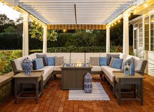 Van Buren Poly Furniture - 3 sofa sections joined by 2 corner sections with a coffee table and end tables