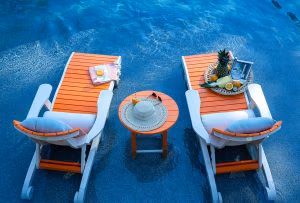 Poly Outdoor Lounge Chairs in pool water