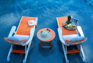 Poly Outdoor Lounge Chairs in pool water