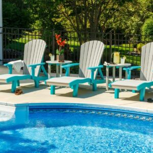 Three Poly Adirondack Lounges by a pool