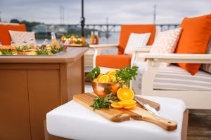 Sequoia colored SeaAira ice pit with refreshments on ice and Ivory colored Mission seating.