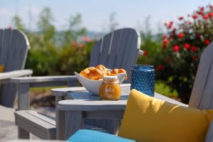 Great Bay Table Attachment between two Great Bay dining chairs.