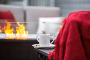 Close up of coffee or tea cup on poly Mission Deep Seating Furniture