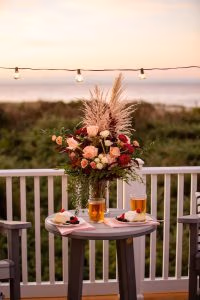 Poly Adirondack table on an ocean front patio.