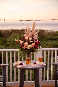 Poly Adirondack table on an ocean front patio.