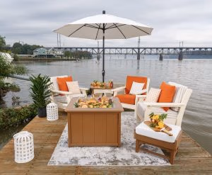 White outdoor umbrella with poly furniture chair set