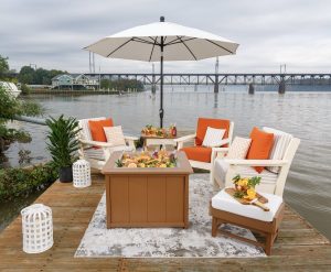 White outdoor umbrella with poly furniture chair set