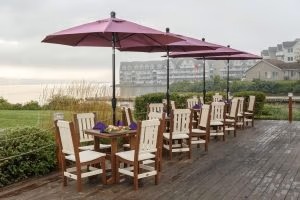 Burgundy outdoor umbrellas with poly furniture dining sets