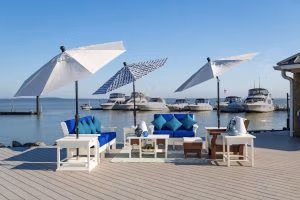 White and blue outdoor umbrellas with poly outdoor furniture