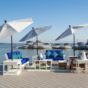White and blue outdoor umbrellas with poly outdoor furniture