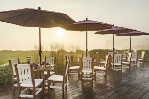 Burgundy outdoor umbrellas with poly furniture dining sets
