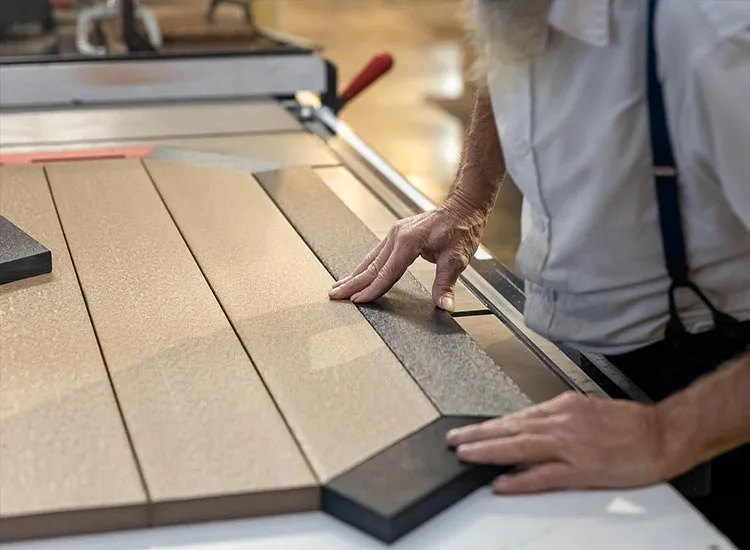 Man assembling a finch poly Table top