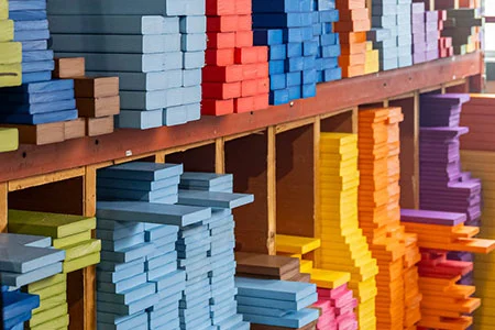 stacks of poly lumber in various colors