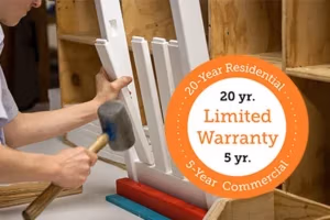 man assembling finch chair back. 20yr limited warranty logo in corner.