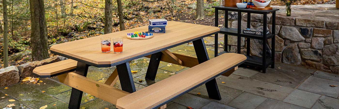 finch picnic table on patio in woods