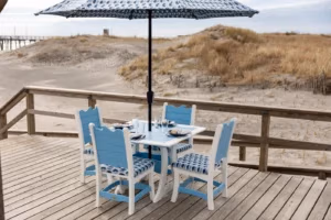 Finch Dining Table Set on the boardwalk by the beach