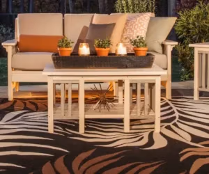 Coffee table sitting on a decorative rug.