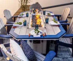 A blue fire table, with a fire burning in the middle.